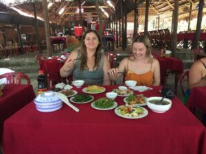 Cham Island: Snorkeling Tour - Getting to Cua Dai Wharf and boarding a traditional wooden boat