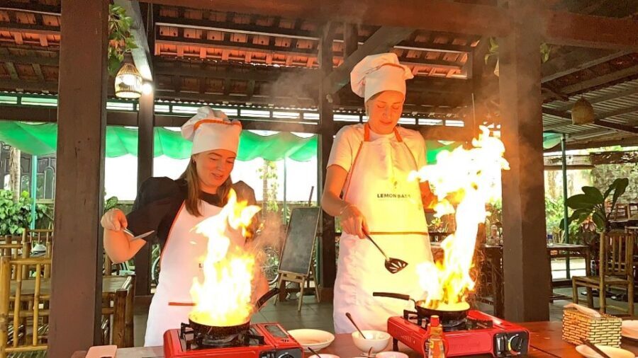 From Hoi An: Cooking Class at Organic Farm - Cooking the four classics: green papaya salad, clay pot fish, and Bánh Xèo