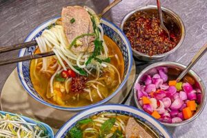 Hoi An Cheap Walking Food Tour - Meeting Madam Khanh, then walking with purpose