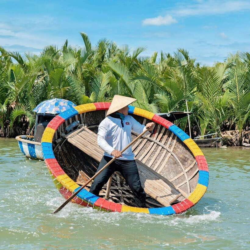 Hoi An: Coconut Basket Boat Ride by Hangcoconut - Paddling the Bamboo Basket Boat on the Cua Dai River