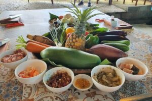 Hoi An Cooking Class With Market Tour and Bamboo Basket Boat Ride - From welcome drink to garden views at the cooking school