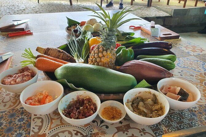 Hoi An Cooking Class With Market Tour and Bamboo Basket Boat Ride - From welcome drink to garden views at the cooking school