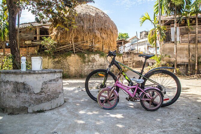 Hoi An: Morning Countryside Tour by Bike - Bicycles, helmets, and the one traffic reality you can’t dodge