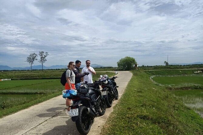 Hoi An to Hai Van pass loop with Motorbike Tour Mr Phu - Stop 3: My Khe Beach road time in Da Nang