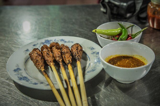 Private Hoi An Evening Food Tastings Tour by Bike - Stop 4: Dinner Along the River With Historic Quarter Views